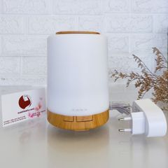 Máy khuếch tán tinh dầu trụ cao, màu trắng đế vân gỗ tích hợp đèn Led 7 màu bắt mắt.