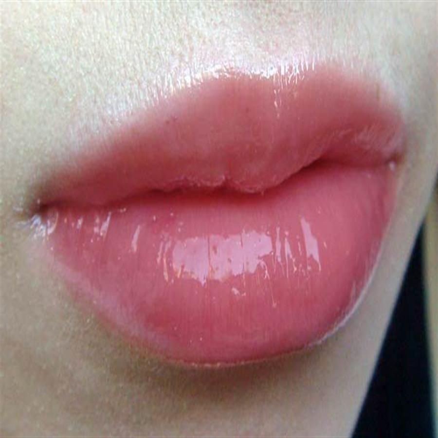 Lipgloss Estee Lauder Pure Color hồng san hô với nhũ nhẹ ngọc trai 4.6ml